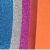 Pianka EVA , mikroguma -  miks kolorów brokatowych: srebrny,niebieski, pink,pomarańcz,czerwony. Op. 5 ark. Kod towaru : MG-310